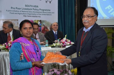 Pashu Sakhi Nimabai being feliciatated during the National workshop on Small Ruminants held in Delhi in January 2015