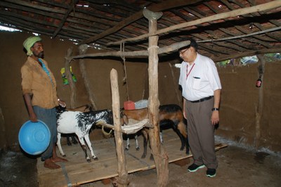 Mr Sanjay Bhoosreddy, Joint Secretary, ANLM, interacting with a goat rearer, during a visit to pilot project villages in July 2014