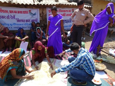 Demonstrating poultry feed making during training programmes