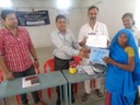 Handing over medical kits to trained Murgi Sakhis